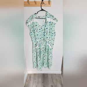 NEW with tags. Unique Vintage dress with sash. Green with salor like pictures.